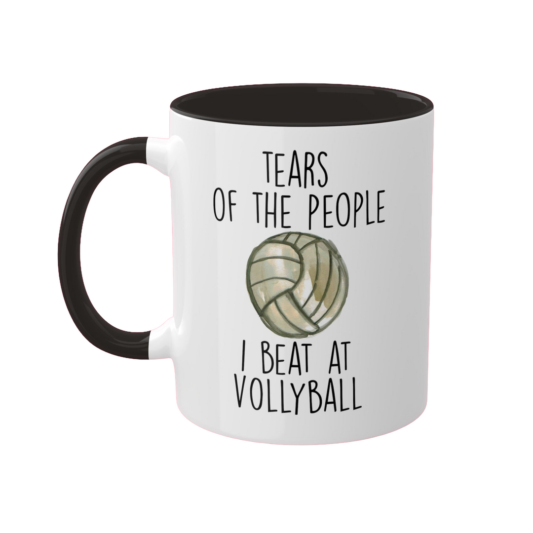 a black and white coffee mug with a volleyball ball on it