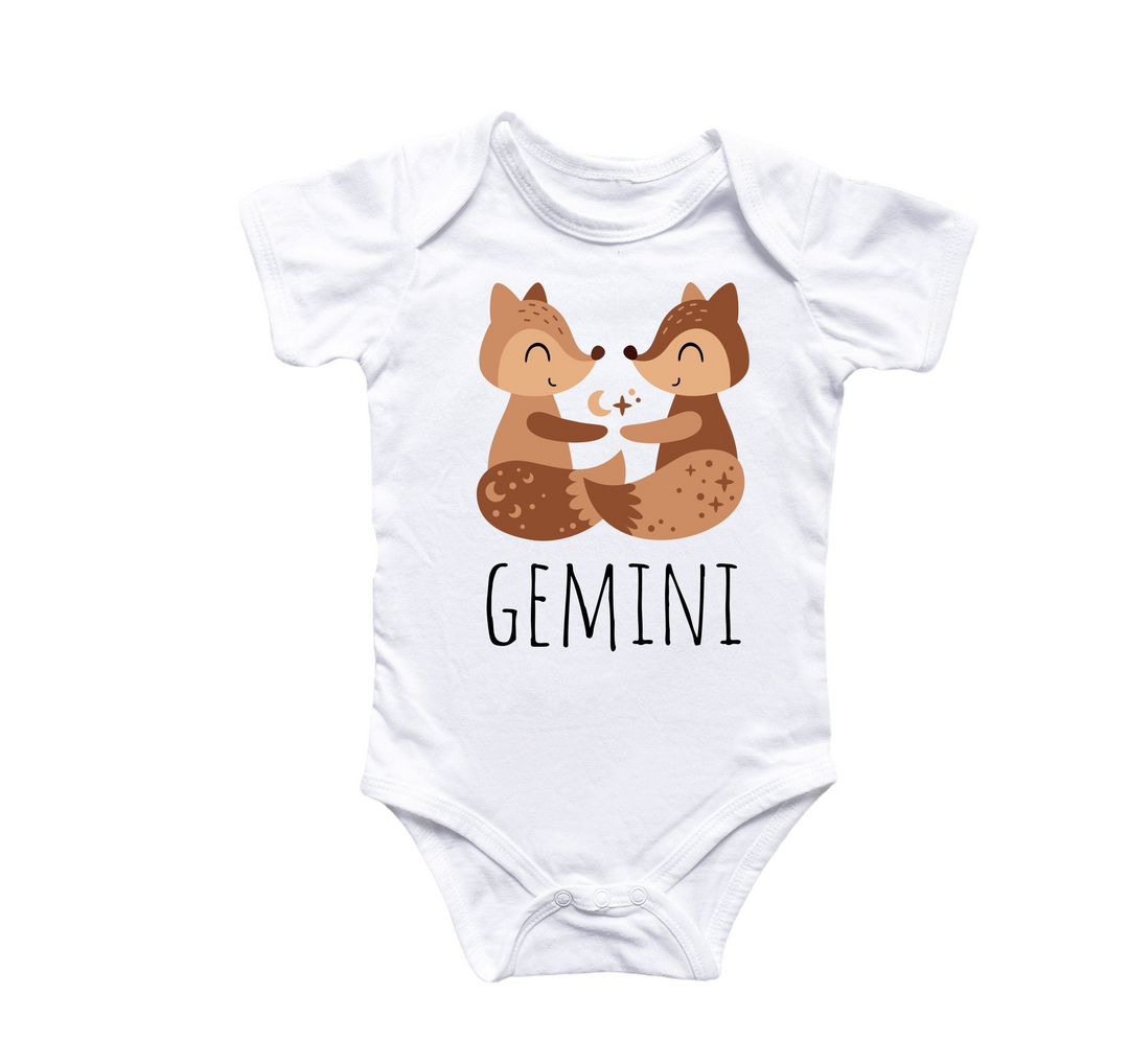 a baby bodysuit with a picture of two foxes hugging