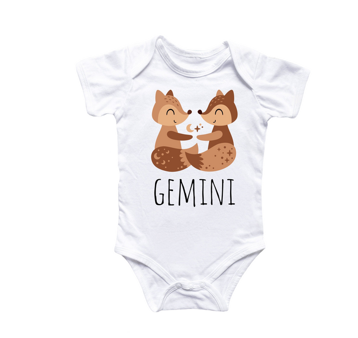 a baby bodysuit with a picture of two foxes hugging