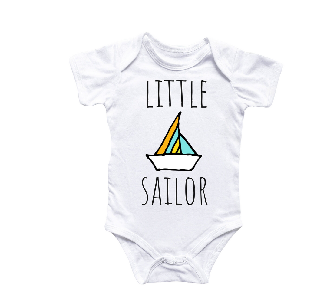 a white bodysuit with a sailboat on it