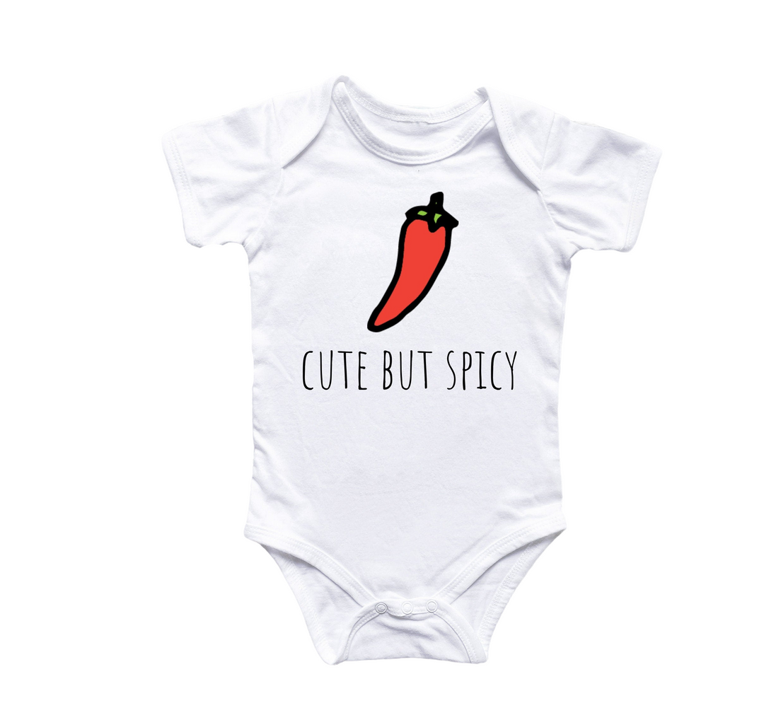 a white bodysuit with a red chili pepper on it