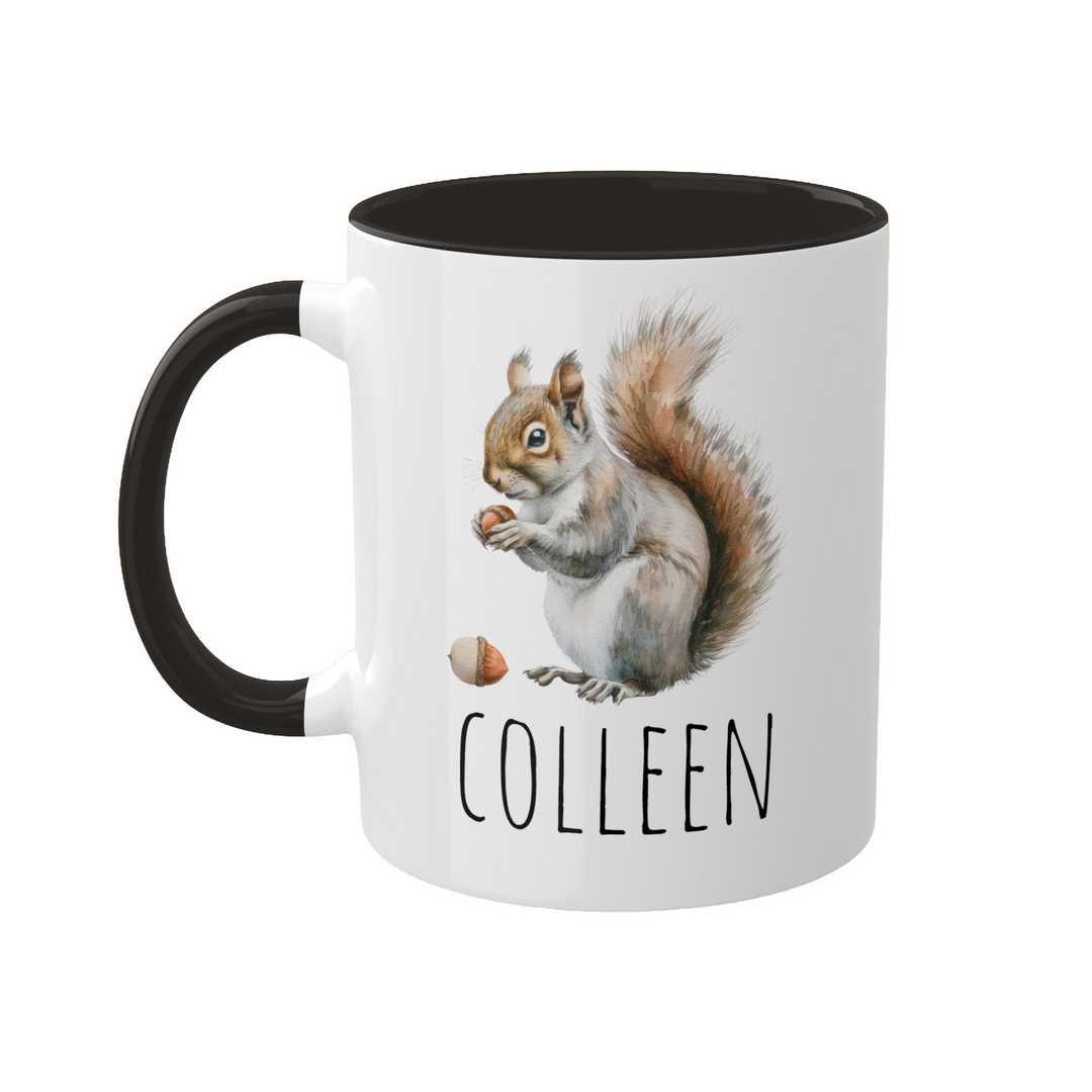 a black and white coffee mug with a picture of a squirrel