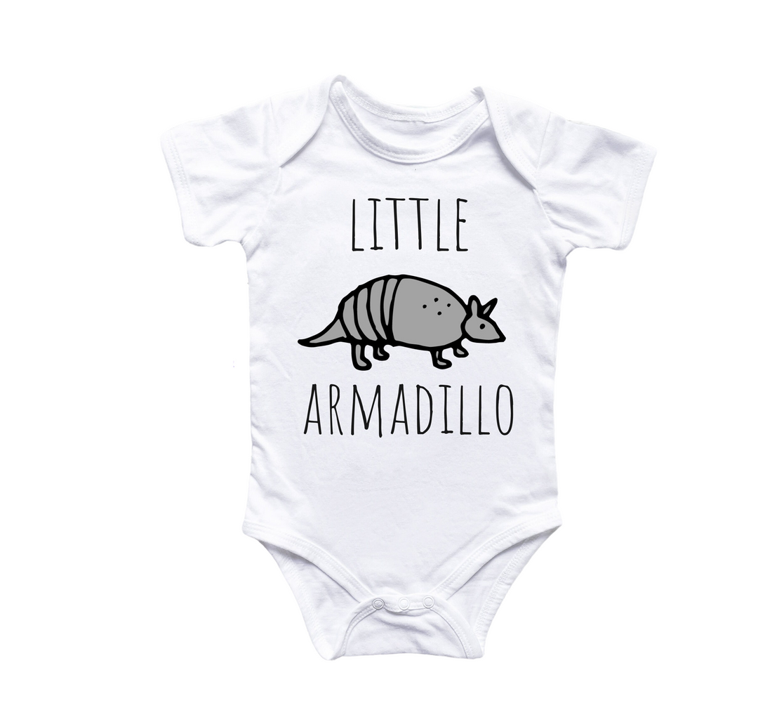 a white bodysuit with an armadillo on it