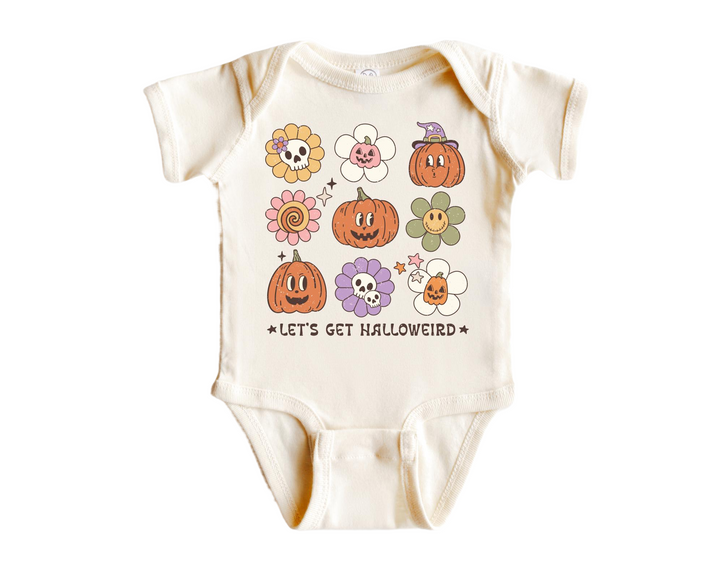 a baby bodysuit with pumpkins and flowers on it