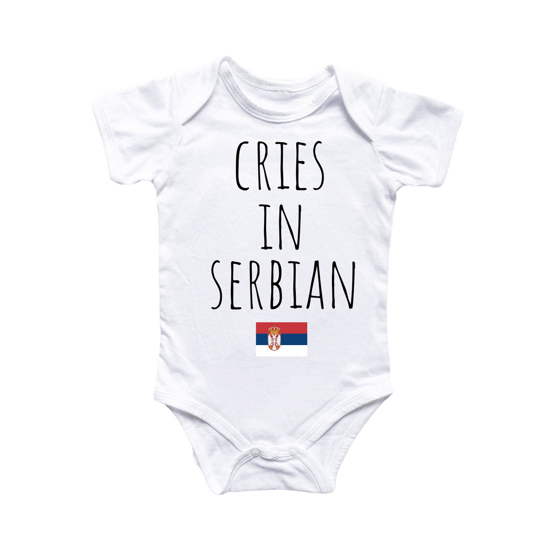 a white bodysuit with the words crises in serbian printed on it