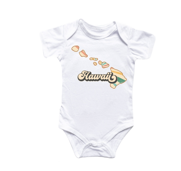 a white bodysuit with the word hawaii printed on it