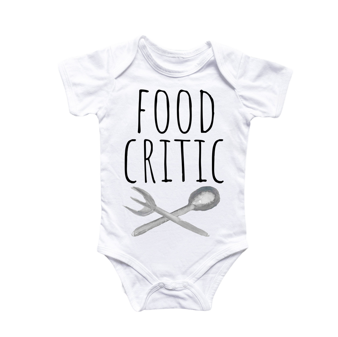 a baby bodysuit with a spoon and fork on it