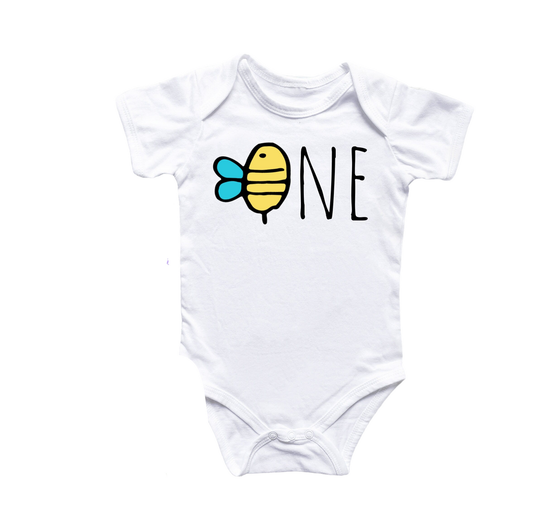 a white onesuit with a bee on it