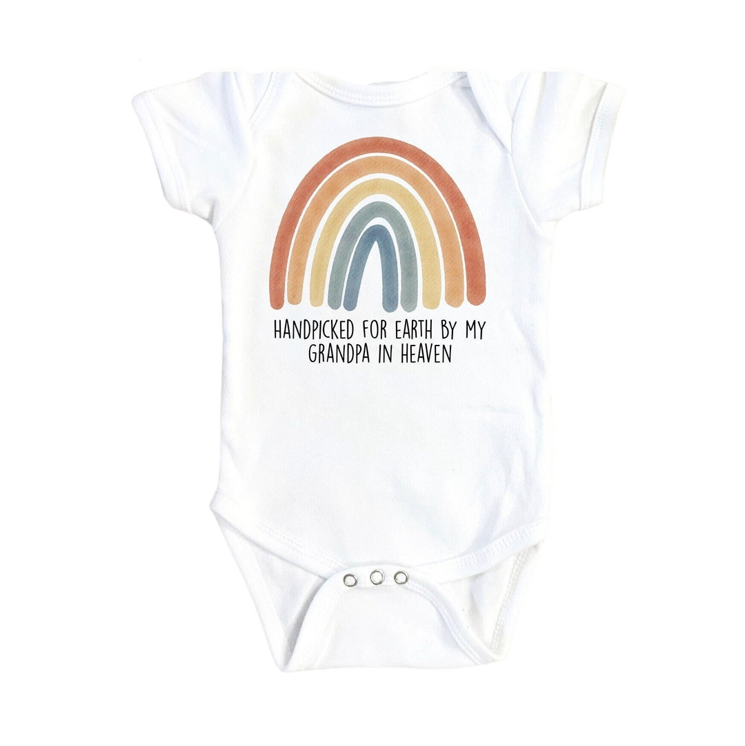 a baby bodysuit with a rainbow on it