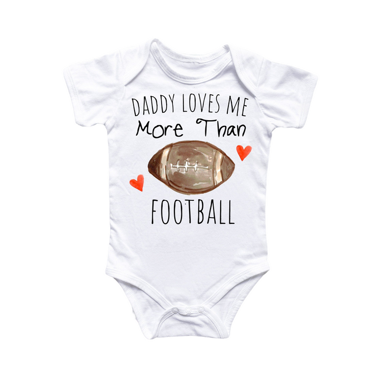 a baby bodysuit that says daddy loves me more than football