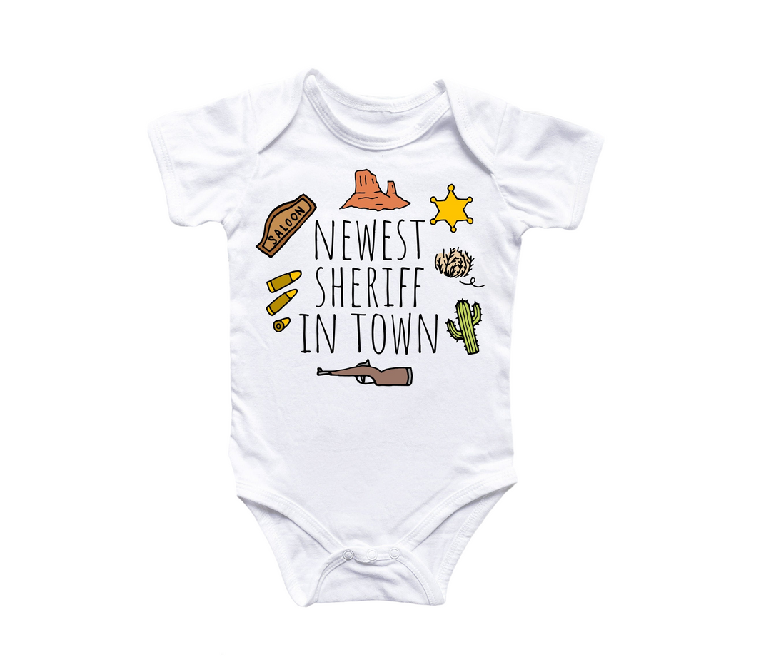 a white baby bodysuit with the words newest sheriff in town