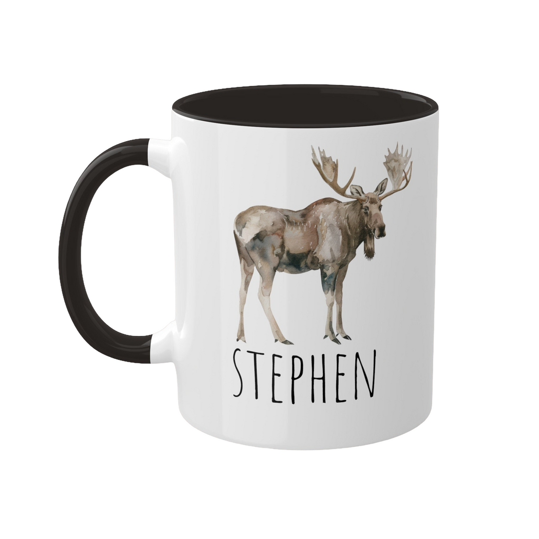 a white and black coffee mug with a picture of a moose