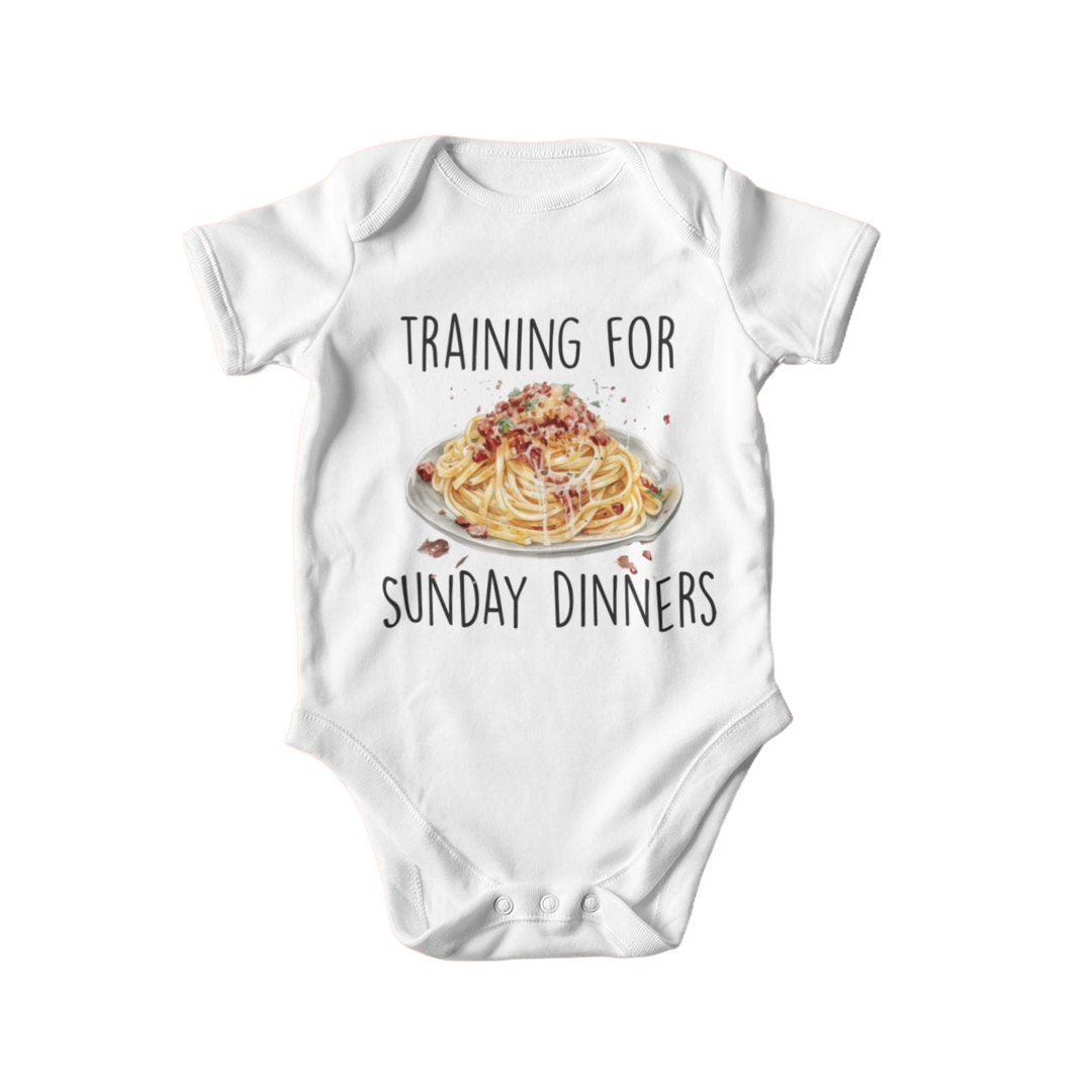 a baby bodysuit that says training for sunday dinners