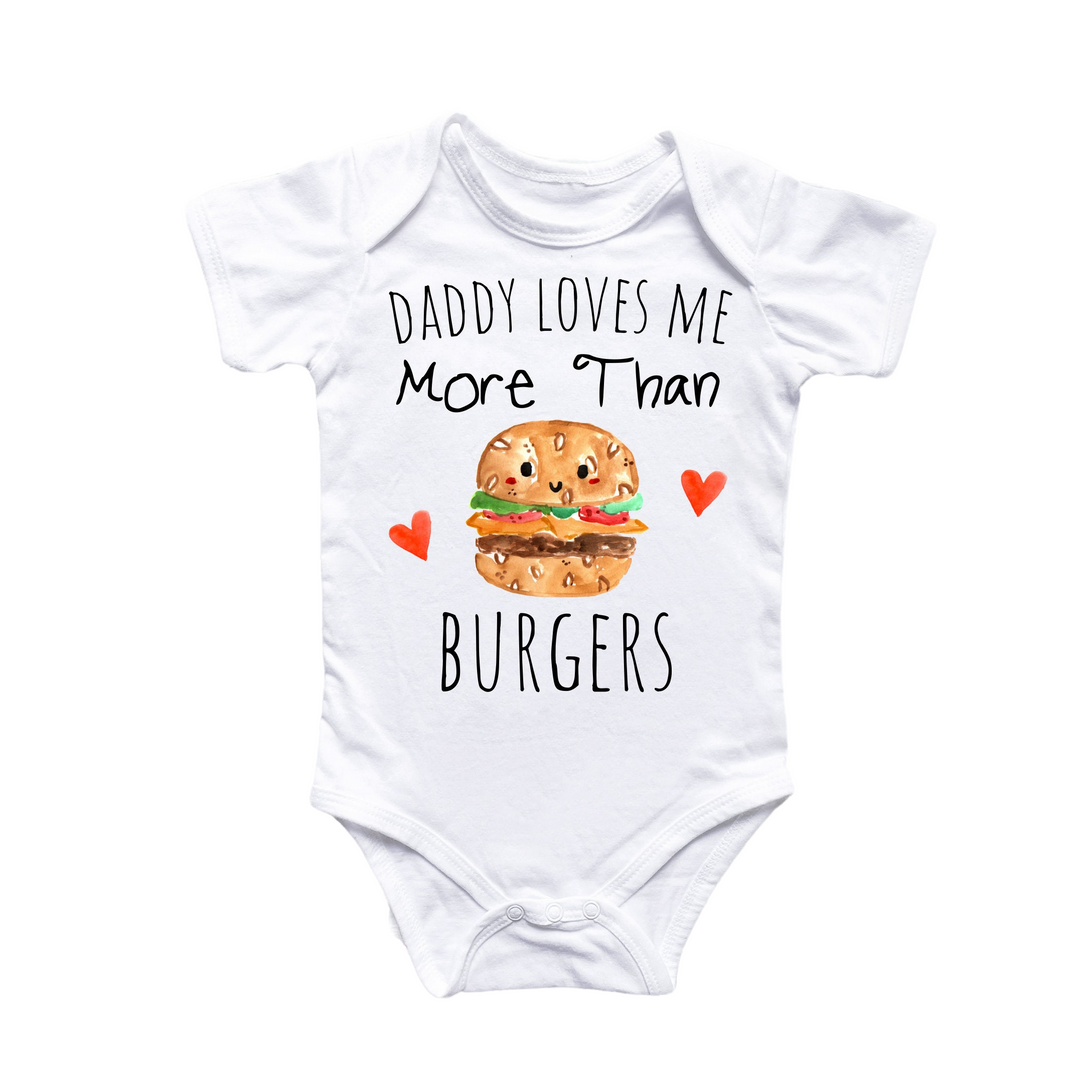 a baby bodysuit that says daddy loves me more than burgers