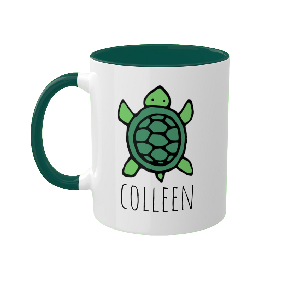 a green and white coffee mug with a turtle on it