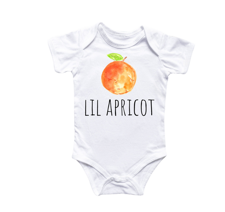 a white bodysuit with an orange and the words lil apricot on it