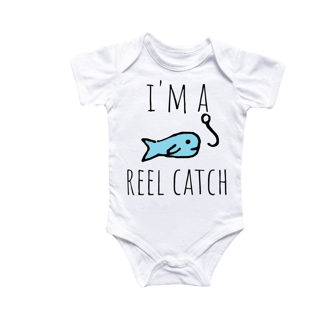 a white bodysuit with a blue fish saying i'm a reel catch