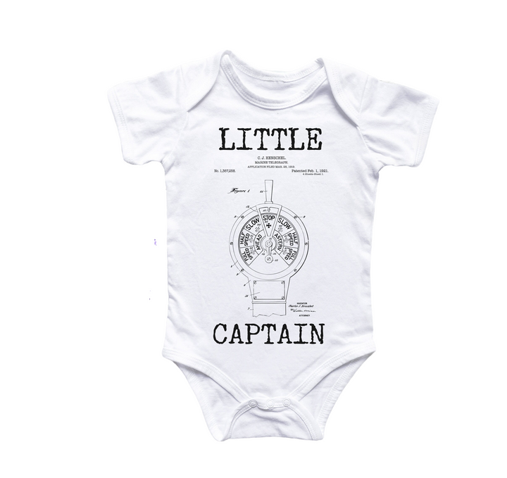 a white bodysuit with the words little captain printed on it