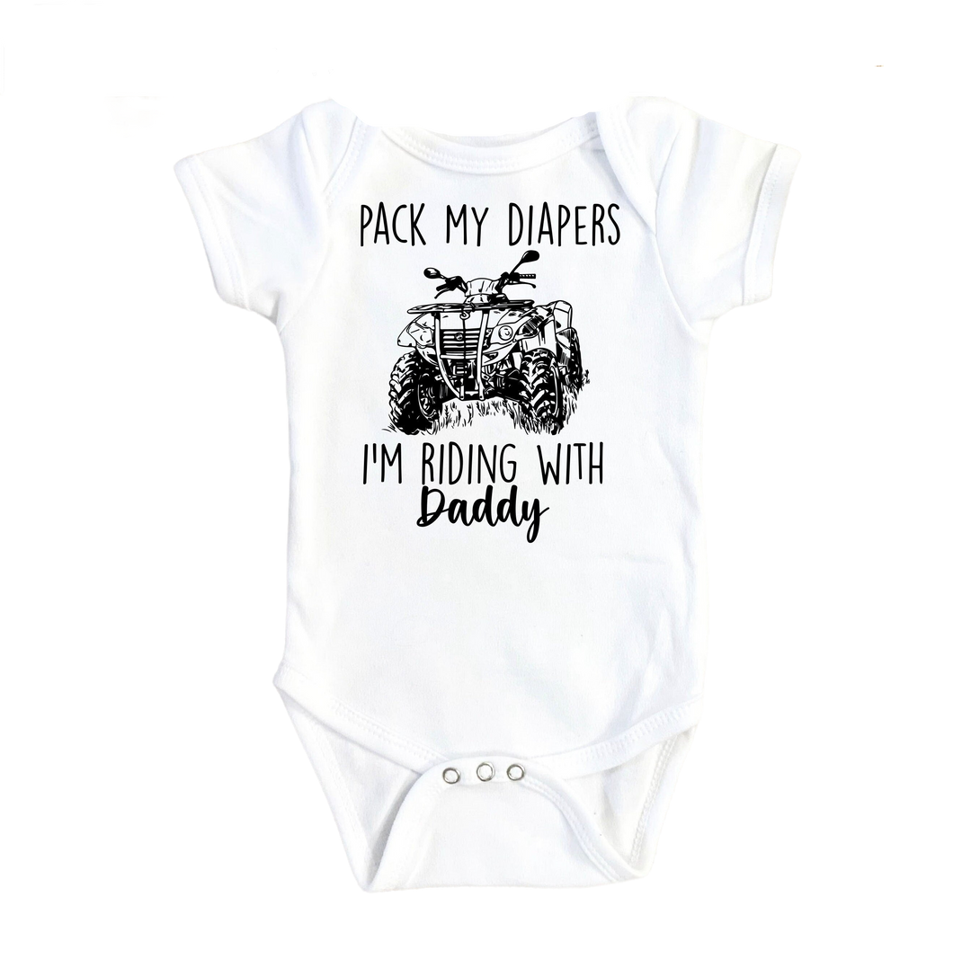 a baby bodysuit with a picture of a tractor on it