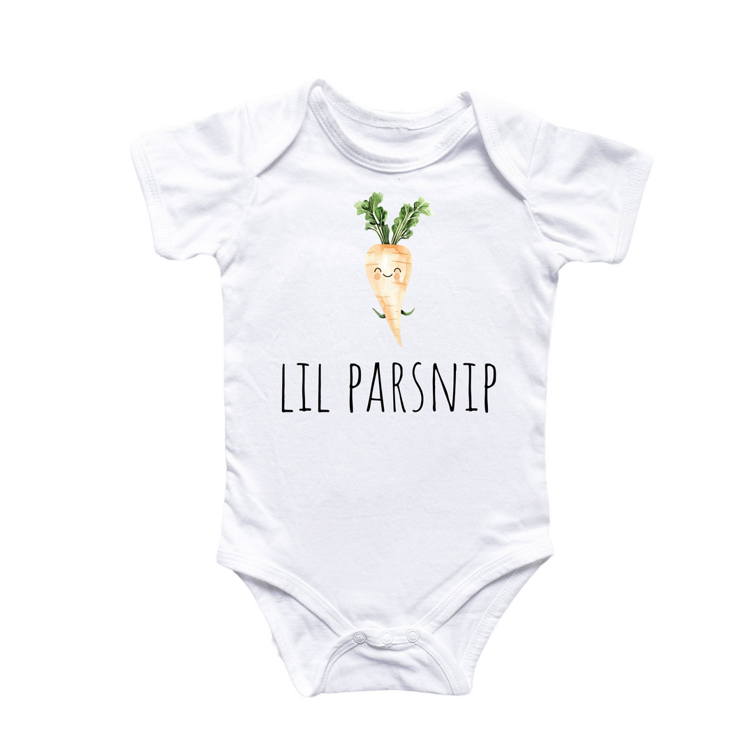 a white bodysuit with a picture of a carrot on it