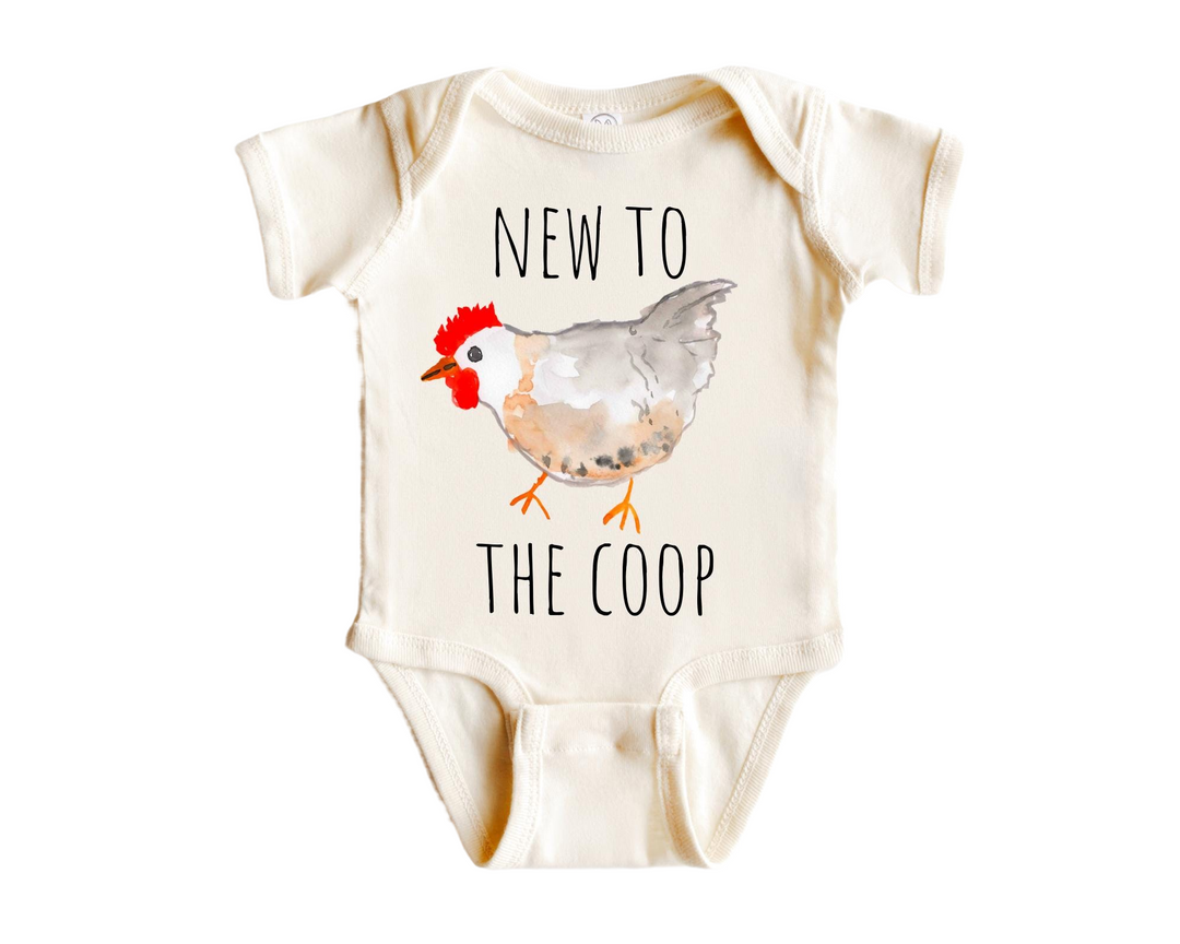 a baby bodysuit with a chicken on it