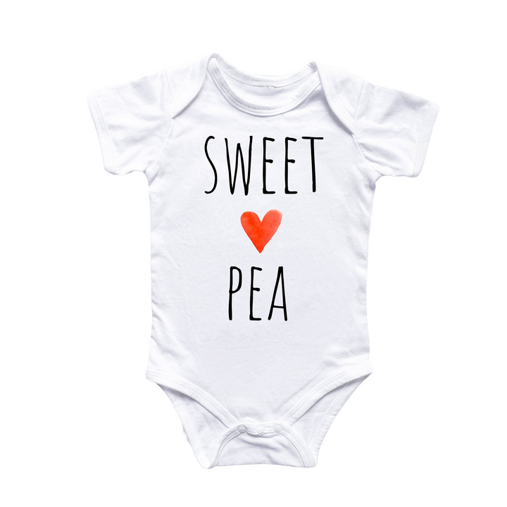 a white bodysuit with a red heart that says sweet pea