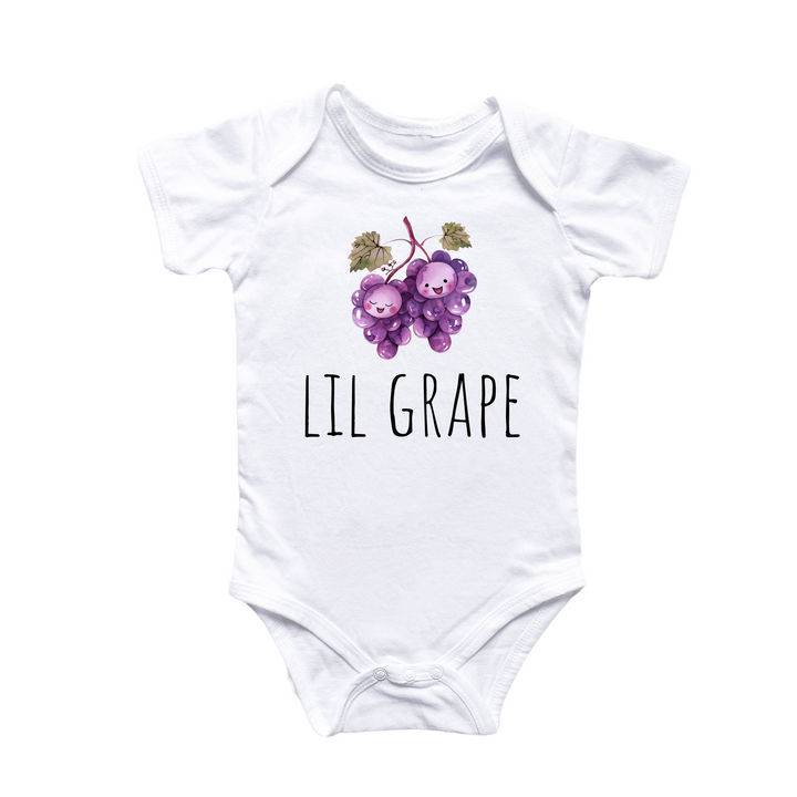 a white bodysuit with a bunch of grapes on it