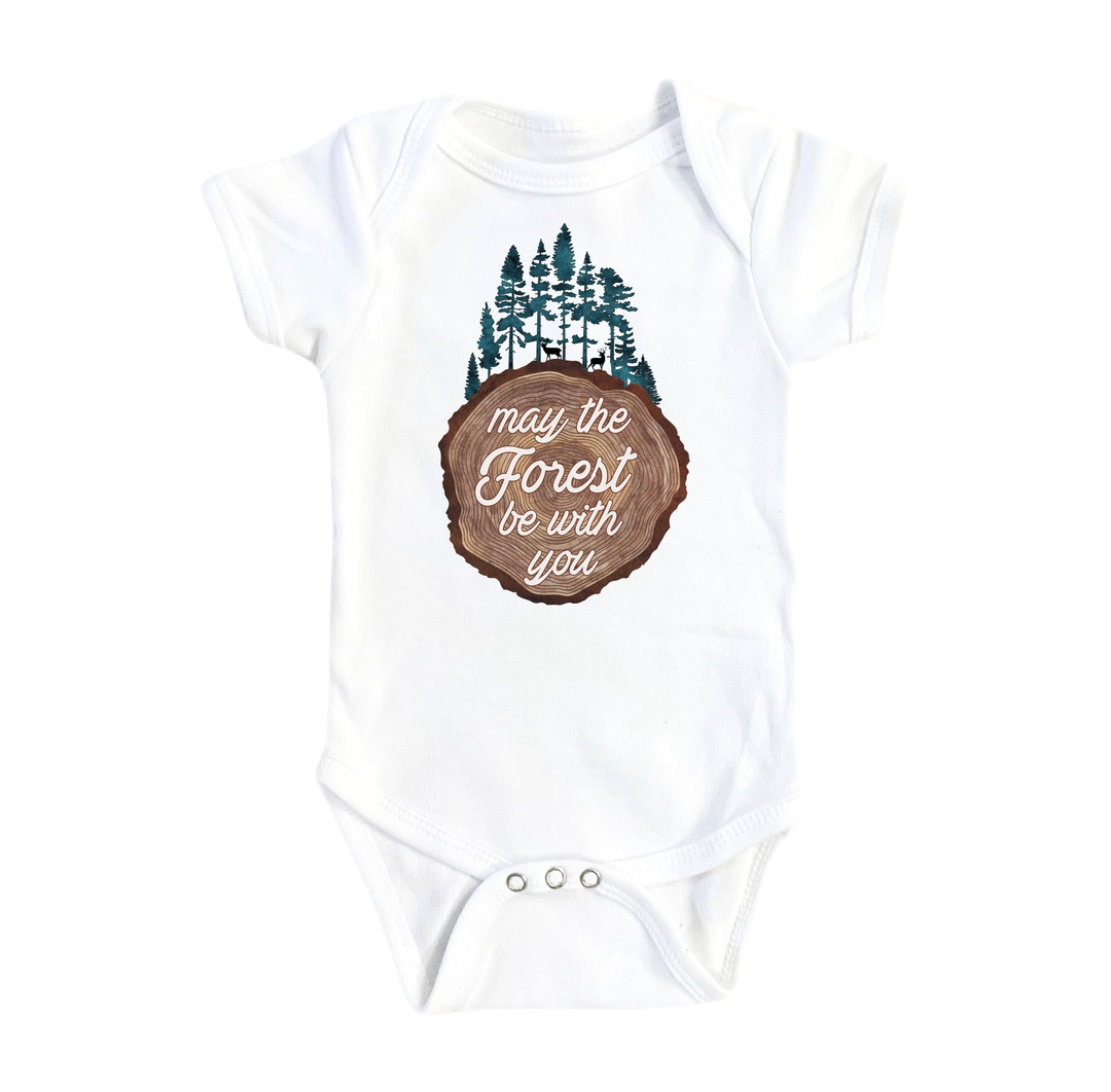 a baby bodysuit with a forest scene on it