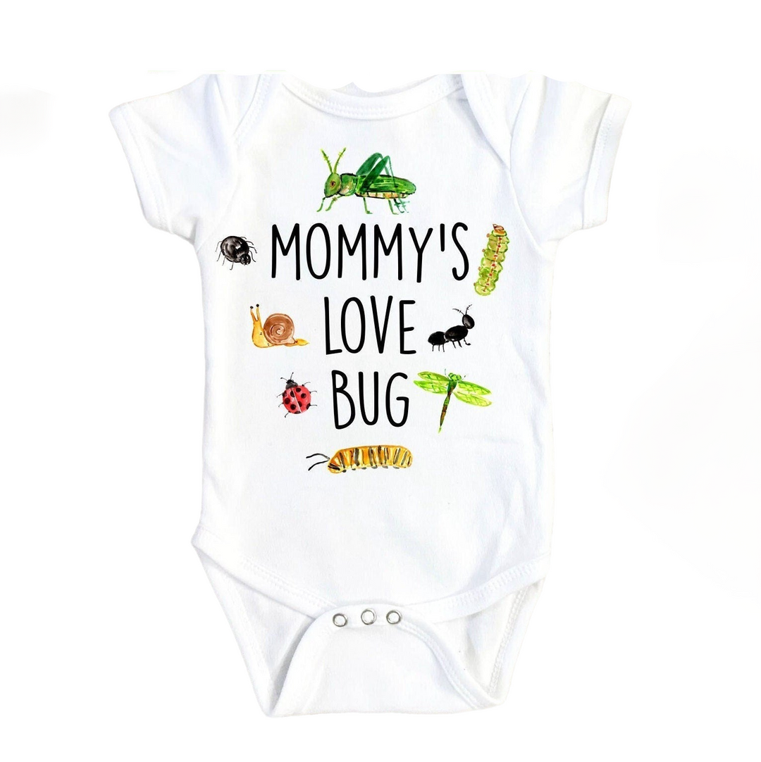 a white baby bodysuit with a picture of bugs on it