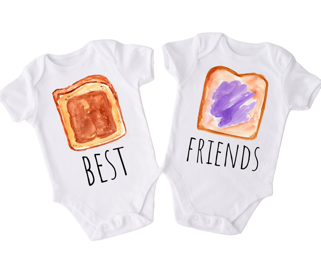 two baby onesuits with the words best friends written on them