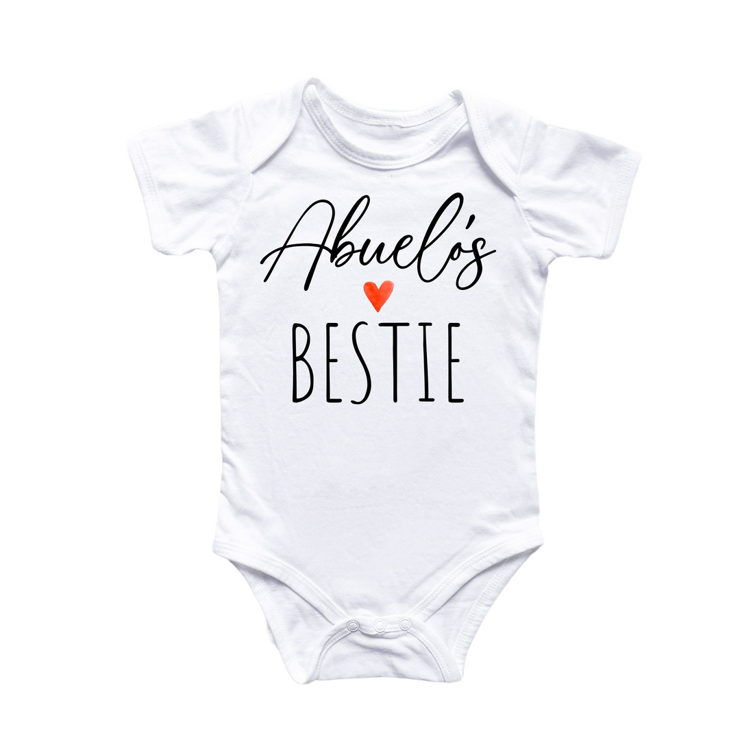 a white bodysuit with the words,'bestie'written on it