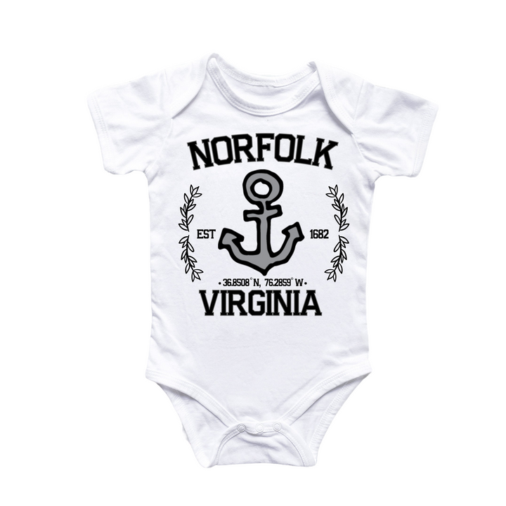 a white bodysuit with a black anchor on it