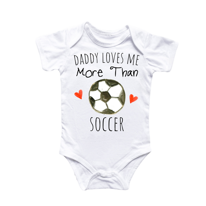 a baby bodysuit that says daddy loves me more than soccer