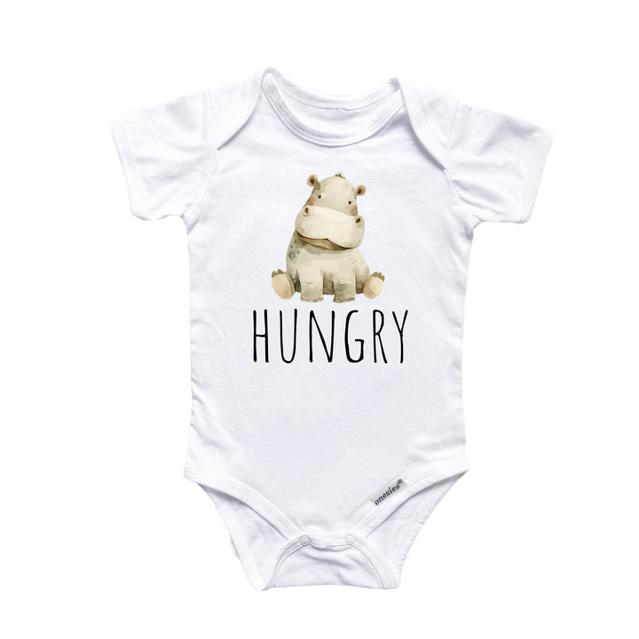 a white baby bodysuit with a picture of a rhino on it