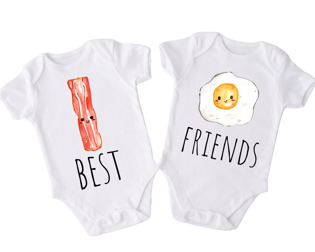 two baby onesuits with the words best and best eggs on them