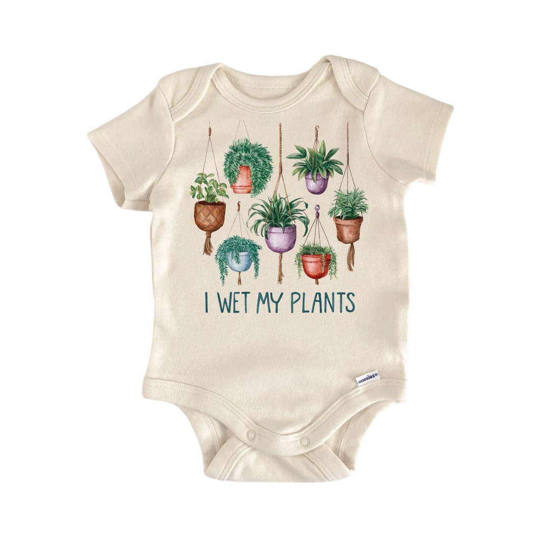 a baby bodysuit with plants on it