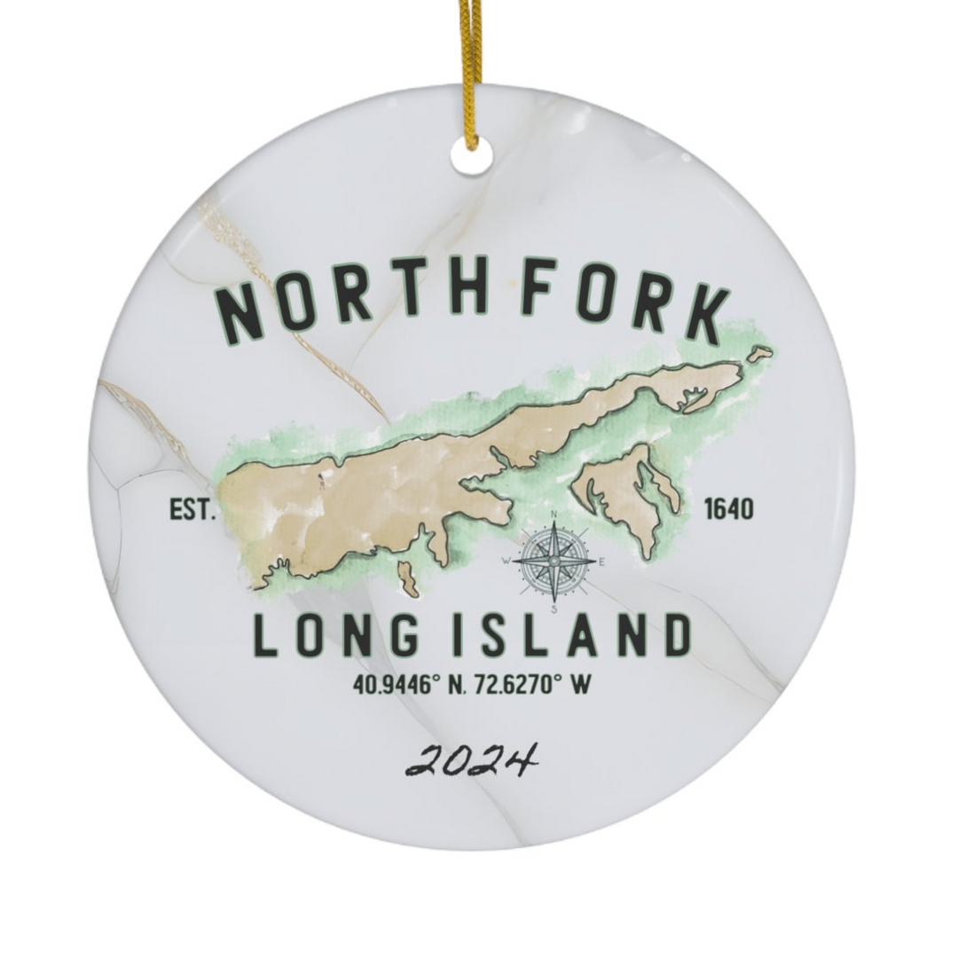 a white ornament with a map of the island of long island