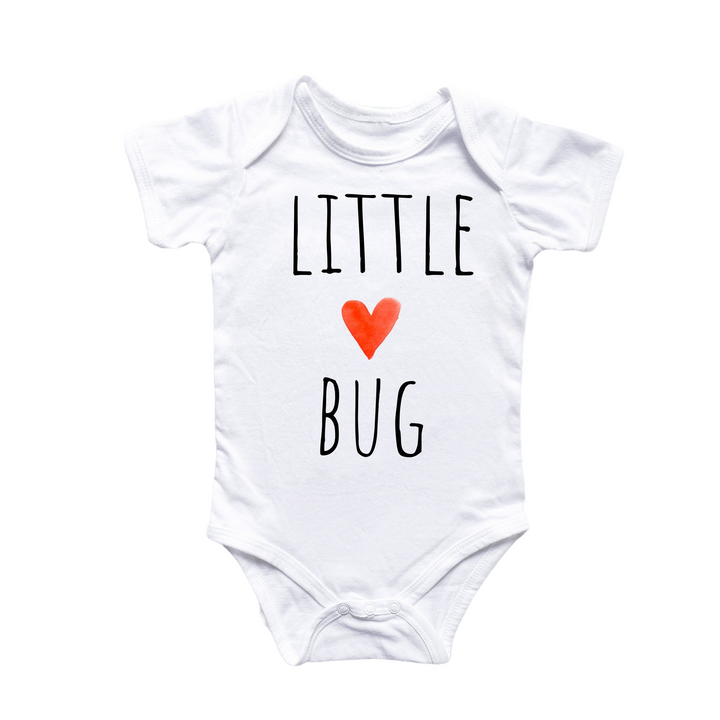 a white bodysuit with a red heart that says little bug