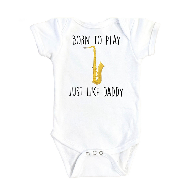 a white bodysuit with a yellow saxophone on it