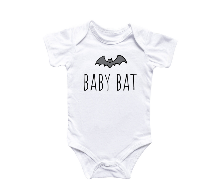 a white baby bodysuit with a bat on it