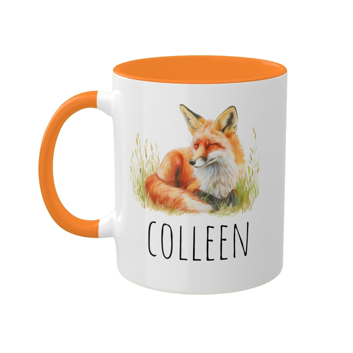 an orange and white coffee mug with a picture of a fox