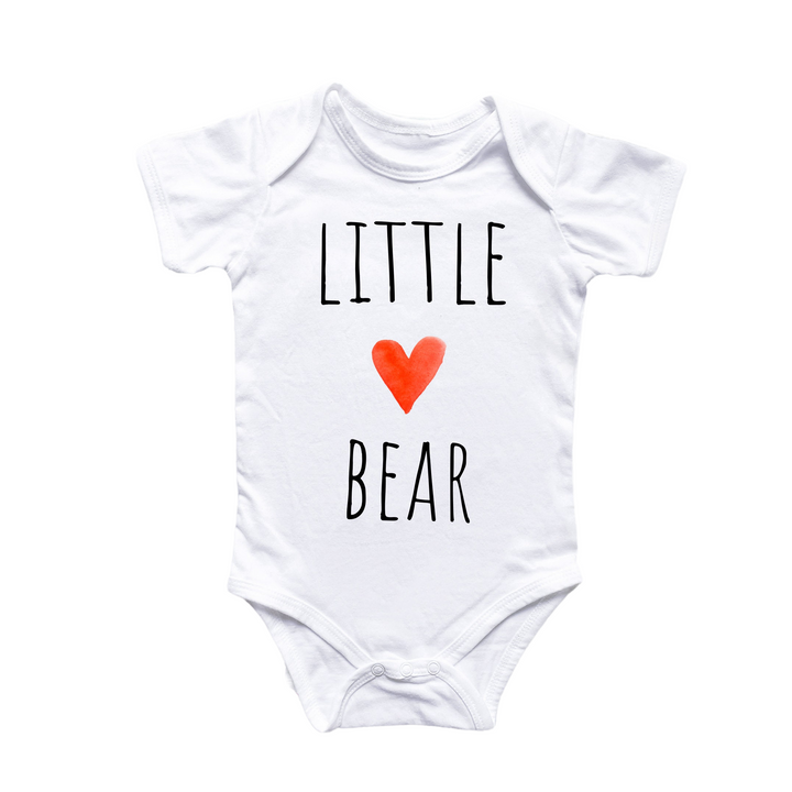 a white bodysuit with a red heart that says little bear