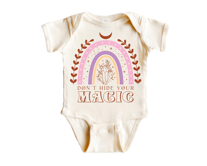 a baby bodysuit that says don't hide your magic