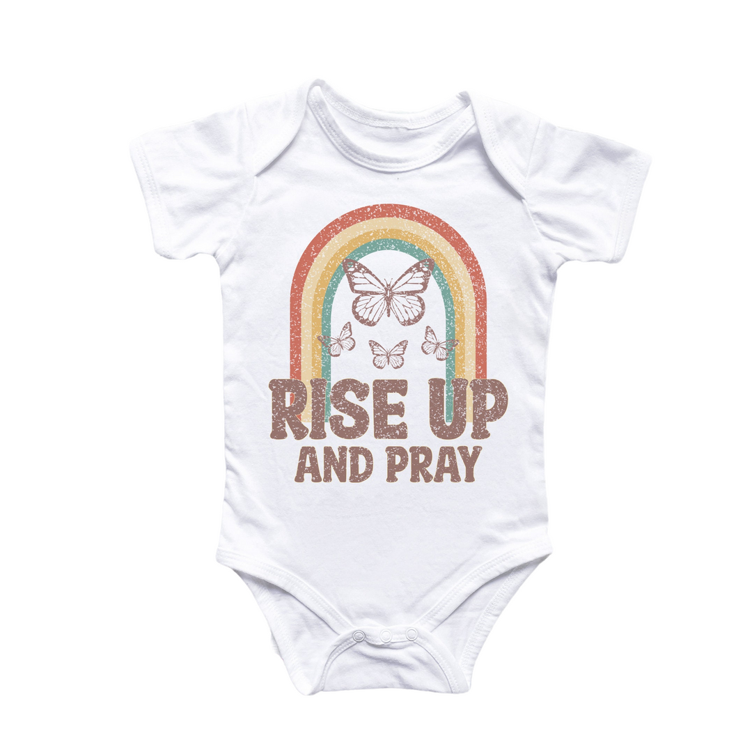 a baby bodysuit that says rise up and pray