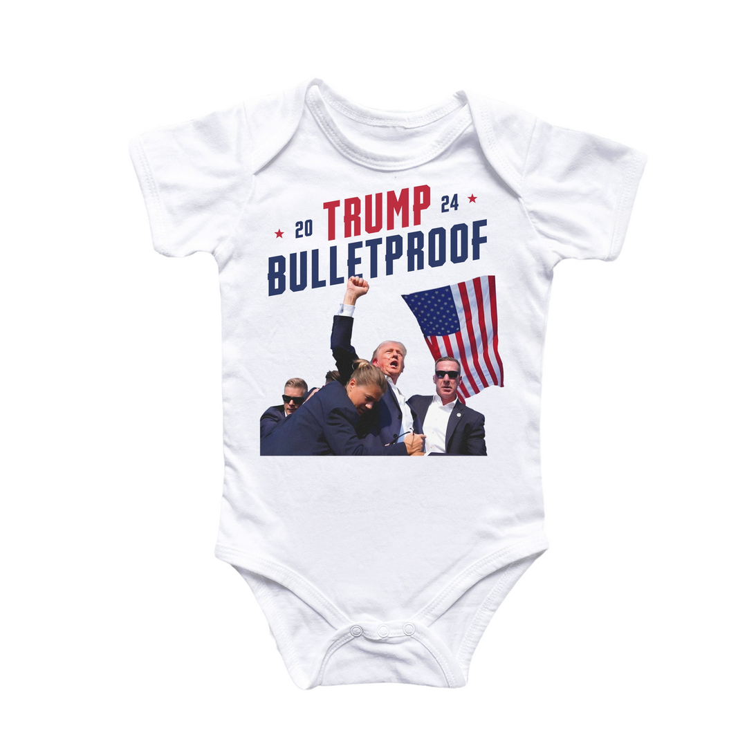 a baby bodysuit with a picture of a man holding an american flag