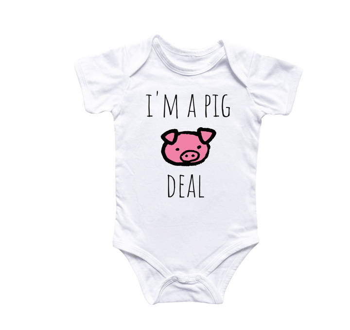 a white bodysuit with a pink pig saying i'm a pig deal