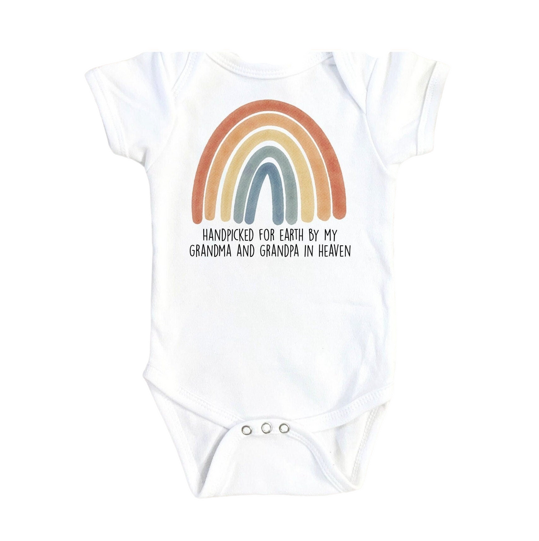 a baby bodysuit with a rainbow on it