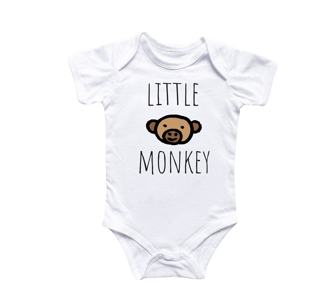 a white baby bodysuit with a monkey on it