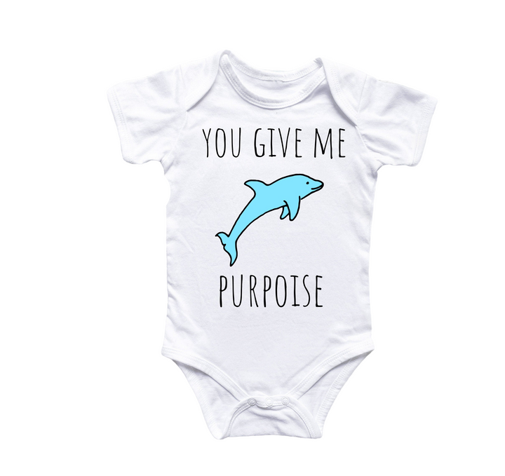 a baby bodysuit with a dolphin saying you give me purpose