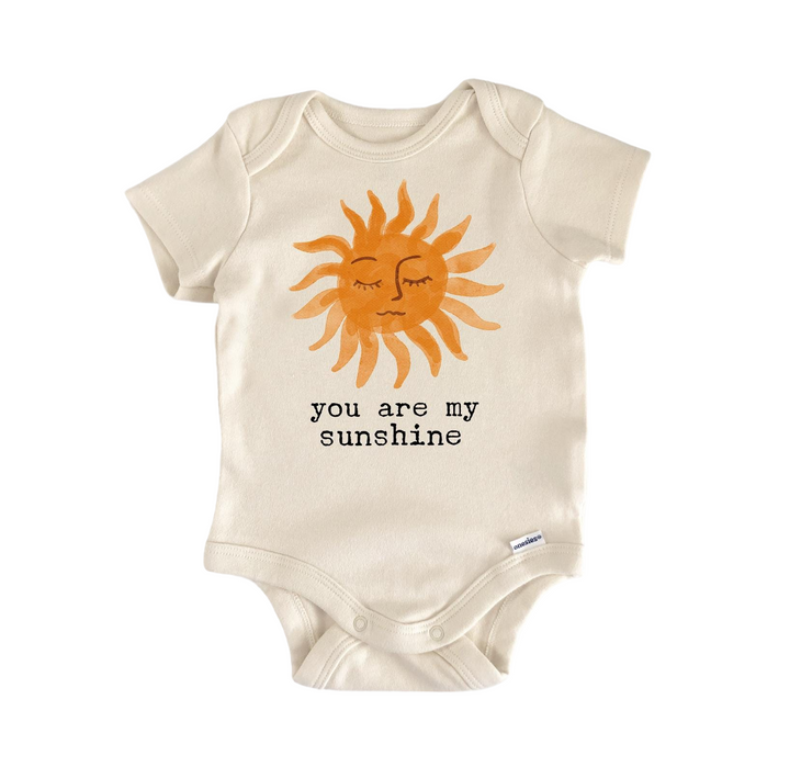 a baby bodysuit with a picture of a sun on it